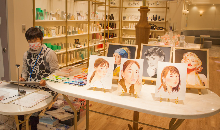 似顔絵出張派遣似顔絵を描いている手元の写真姫路市